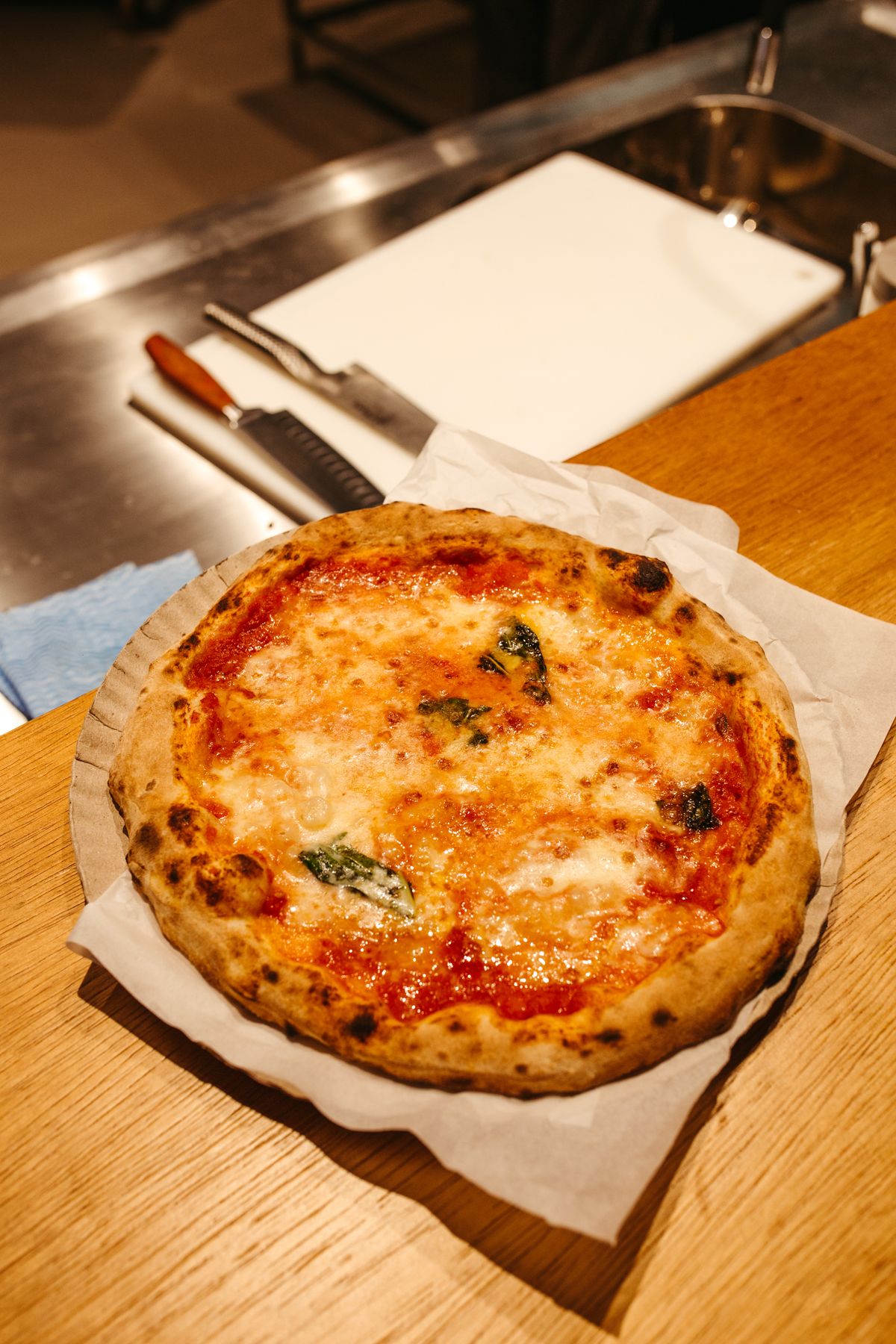 Illustrative pizza photograph; this is not À Steak & Pizza