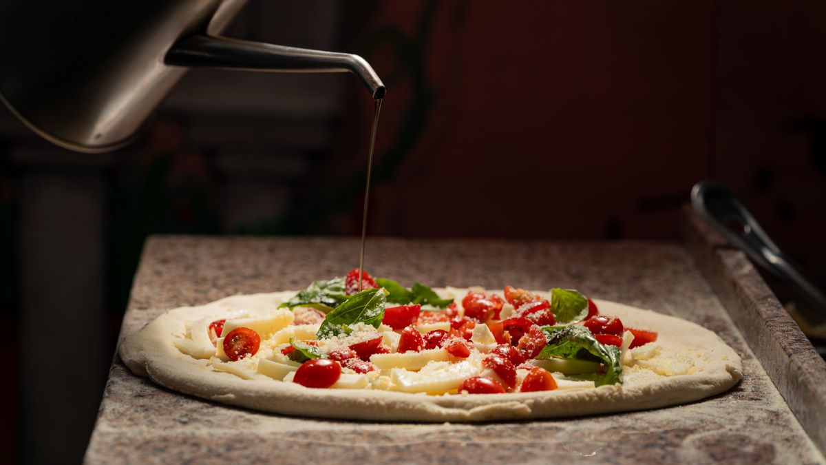Illustrative pizza photograph; this is not Sisters Tavern & Pizzeria