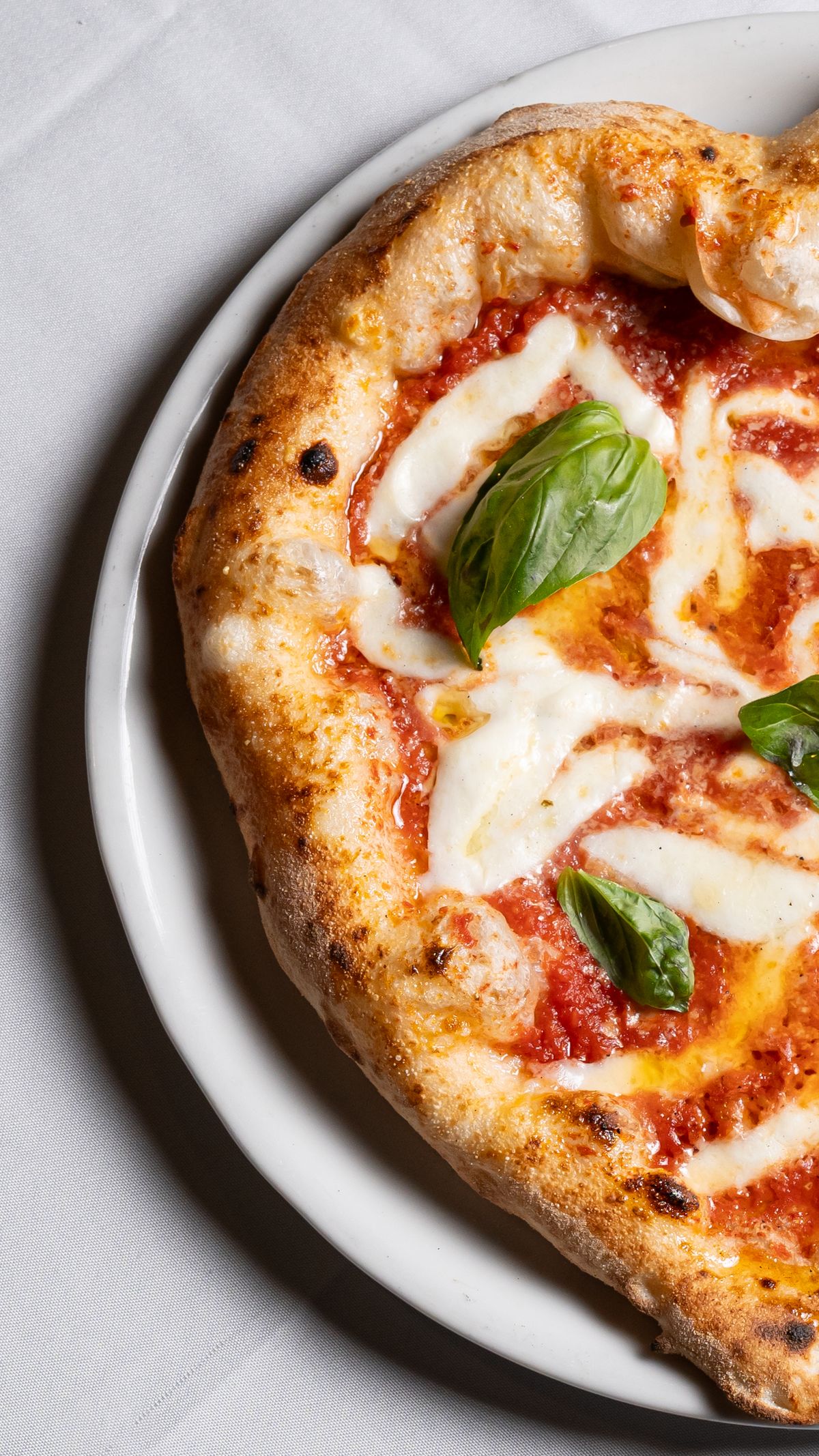 Illustrative pizza photograph; this is not Al Dente QN